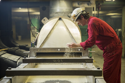 An operator inspects nylon 6,6 pellets at Ascend's Pensacola plant. Using ISCC Plus' mass balance approach, bio-circular materials perform the same as virgin materials.