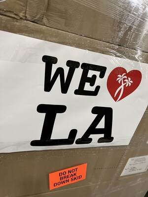 Boxes being loaded on to trucks to be delivered to Los Angeles