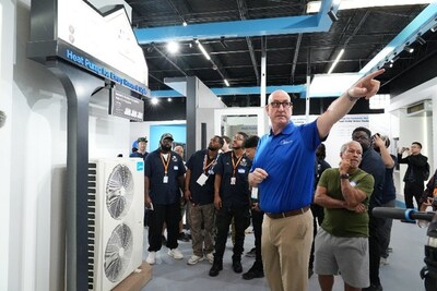 David Rames, Senior Product Manager, giving a tour of the showroom to students from Orange Technical College