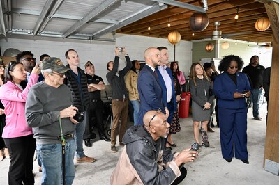 Neighborhood residents, VFW Post 8973 members, and state and local representatives joined the contributing firms on a tour of the Resilient Solar Hub.